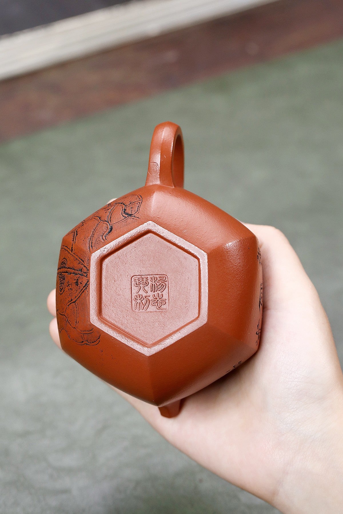 Handmade Yixing purple sand teapot featuring intricate lotus carving, 200CC, crafted by national artist Yang Zhiqin.