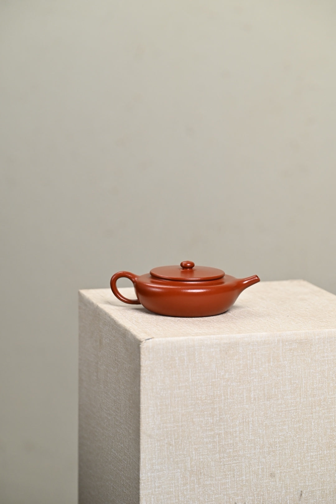 Handmade Yixing purple sand teapot, 150CC, featuring rich red clay and elegant design, perfect for tea enthusiasts.