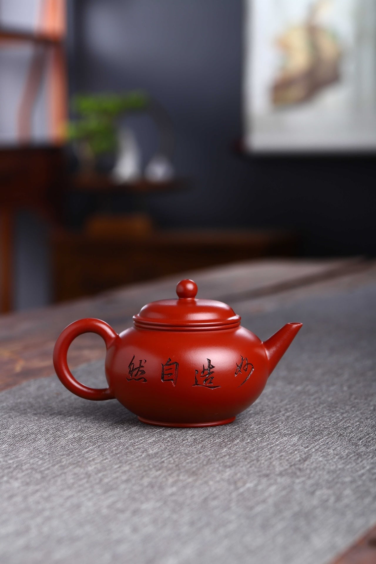 Handmade Yixing purple sand teapot, original design with classic red color, perfect for tea enthusiasts.