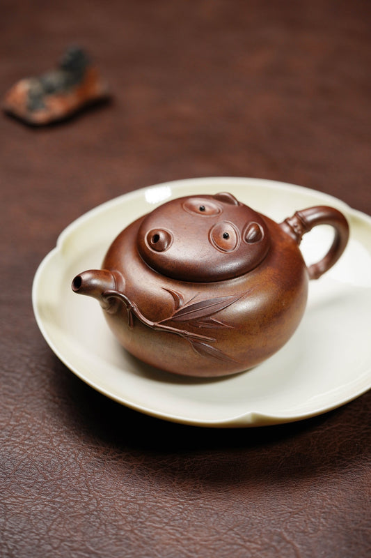 【名称】熊猫竹 【泥料】段泥还原烧 【容量】160Cc内推7孔出水【作者】周洪星