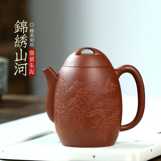 Handmade Yixing purple sand teapot with intricate mountain and river design, crafted from original purple clay.