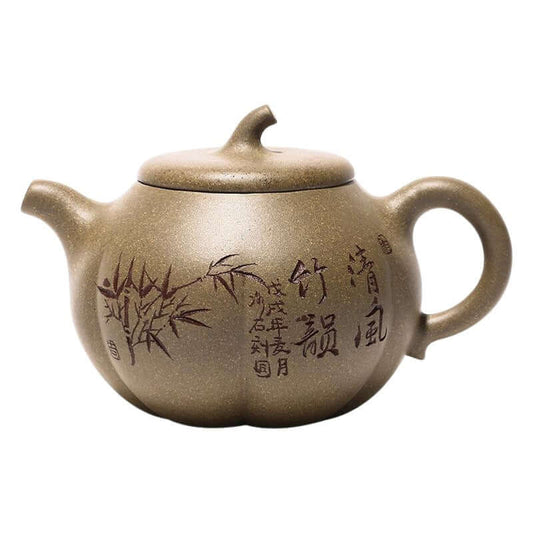 Handmade Yixing purple sand teapot featuring classic pumpkin shape and bamboo etching, perfect for tea enthusiasts.