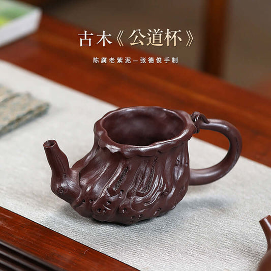 Handmade Yixing purple sand cup, uniquely designed with a wood log shape, perfect for kung fu tea ceremonies.