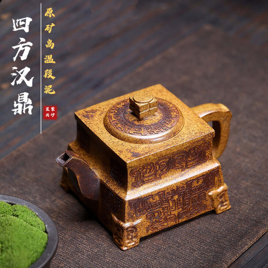 Handmade Yixing purple sand teapot with intricate design, crafted from original purple clay for kung fu tea sets.