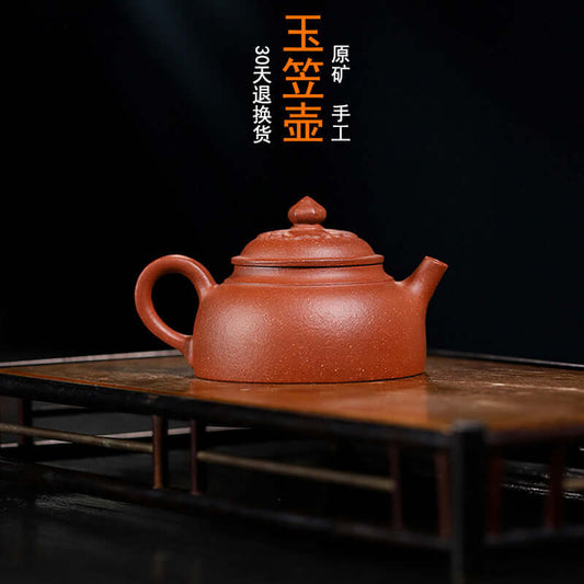Handmade Yixing purple sand teapot with traditional design, crafted from original purple clay for tea enthusiasts.