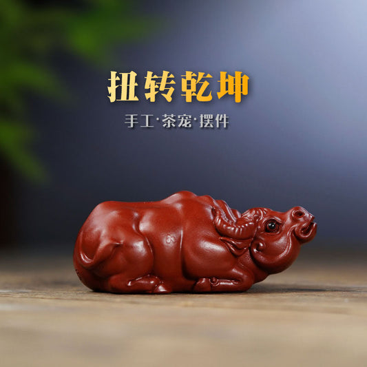 Handmade Yixing purple sand zodiac cattle ornament for tea play, crafted from original zisha materials.