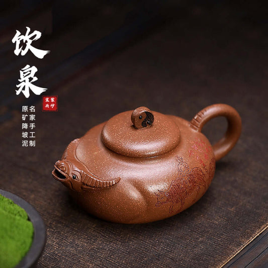 Handmade Yixing purple sand teapot with cow design, crafted from raw ore, perfect for kung fu tea ceremonies.