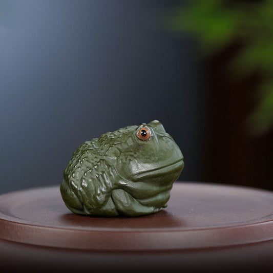 Handmade Yixing purple sand frog sculpture, a creative tea table ornament perfect for gifting.