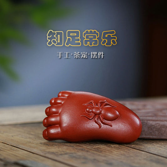 Handmade Yixing purple sand tea pet ornament, featuring a foot sculpture with an ant design, perfect for tea ceremonies.