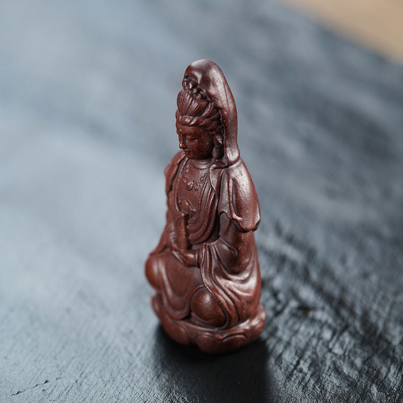 Handmade Yixing purple sand tea pet sculpture of Maitreya Buddha, perfect for tea sets and collectibles.