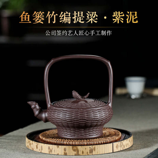 Handmade Yixing purple sand teapot with bamboo handle, showcasing elegant craftsmanship and traditional design.