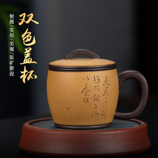Handmade Yixing purple sand cup with double color design, ideal for tea enthusiasts and collectors.