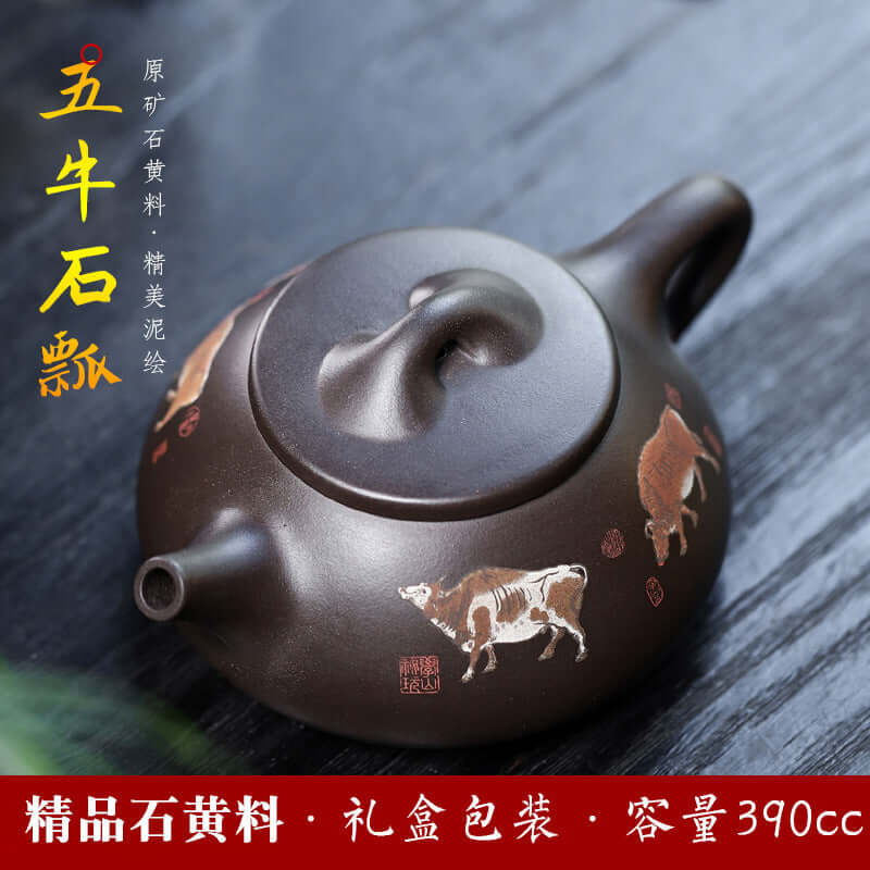 Handmade Yixing purple sand teapot with intricate cow designs, 390cc capacity, traditional kung fu tea set