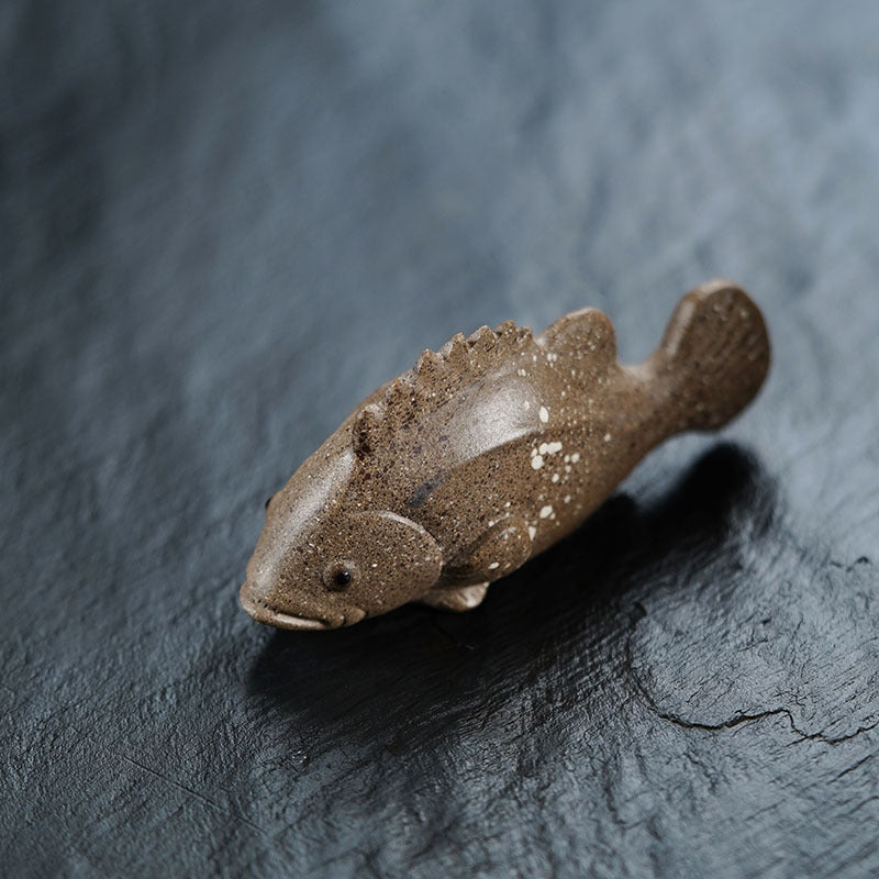 Handmade Yixing purple sand tea pet fish model, perfect for early education and as a unique decorative tea accessory.
