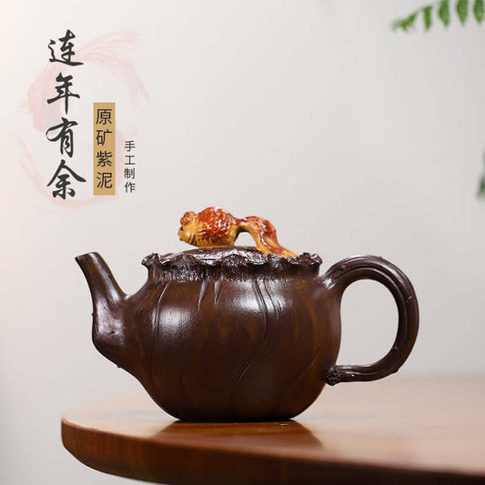 Handmade Yixing purple sand teapot with unique lion-shaped lid, showcasing original craftsmanship.