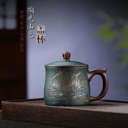 Handmade Yixing purple sand tea cup with lake and mountain scenery, perfect for high-end tea enthusiasts.