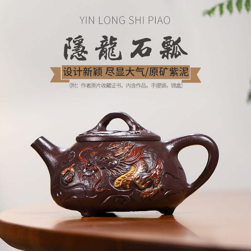 Handmade Yixing purple sand teapot featuring intricate dragon design; high-quality original purple sand craft.