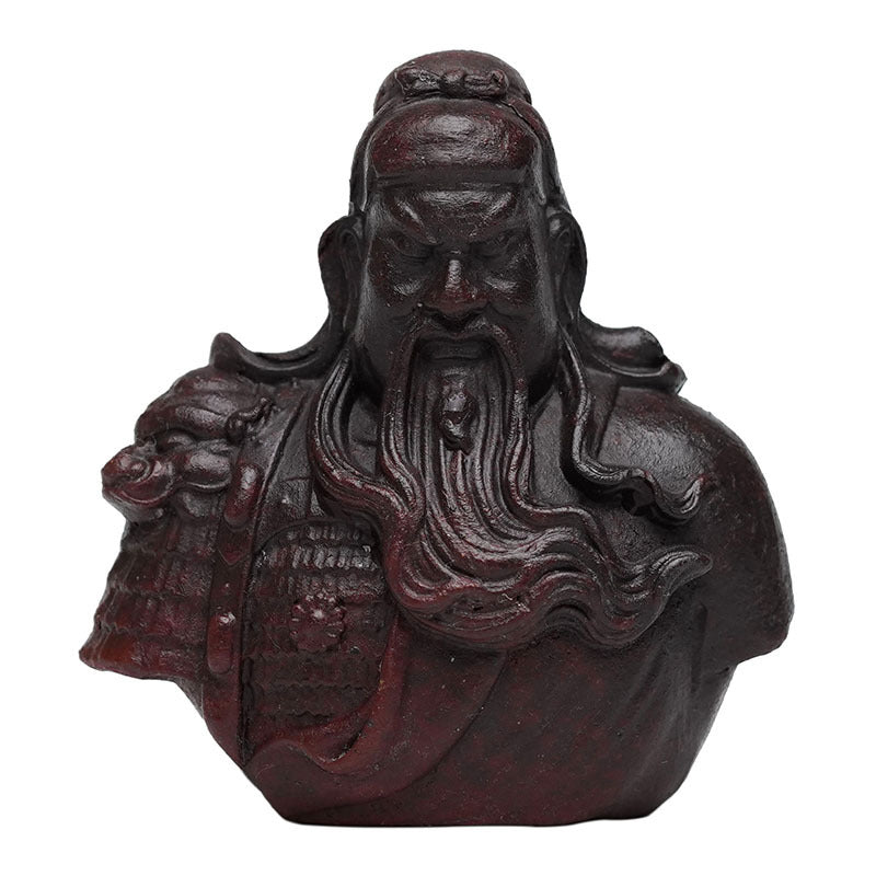 Handmade Yixing purple sand sculpture of Guan Gong, a unique tea ornament for tea enthusiasts and collectors.