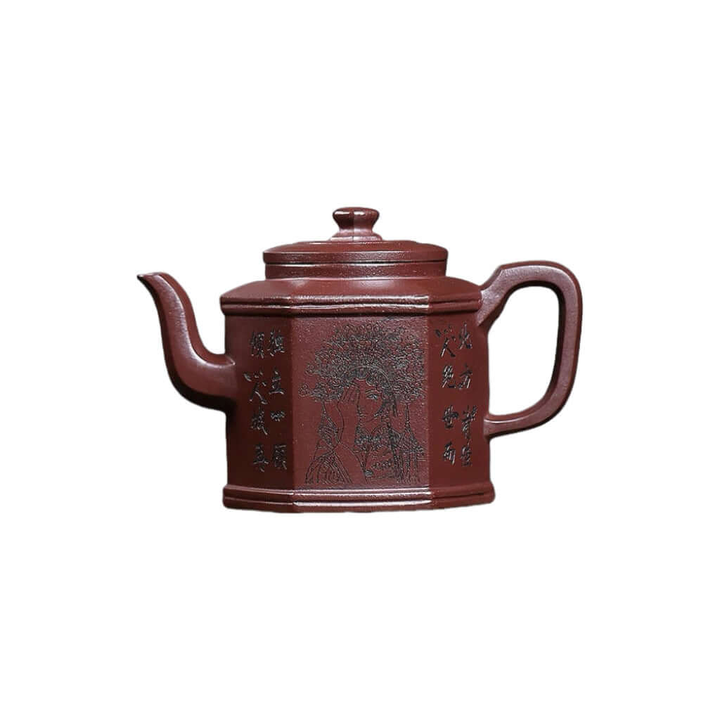 Handmade Yixing purple sand teapot with engraved design, crafted from original purple clay for elegant tea serving.