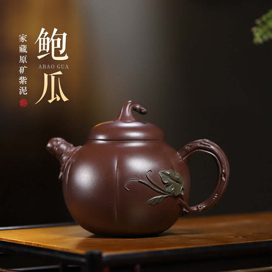 Handmade Yixing purple sand teapot featuring a unique Bao melon design with floral decoration, perfect for brewing scented tea.