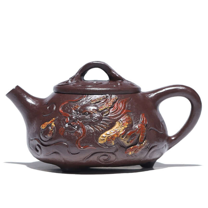 Handmade Yixing purple sand teapot featuring intricate dragon design, crafted from original purple sand, ideal for tea brewing.