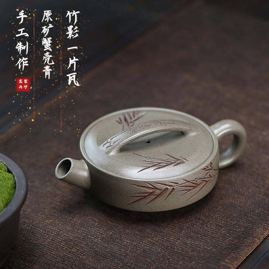Handmade Yixing purple sand teapot with bamboo design, crafted from original purple clay for Kung Fu tea sets.