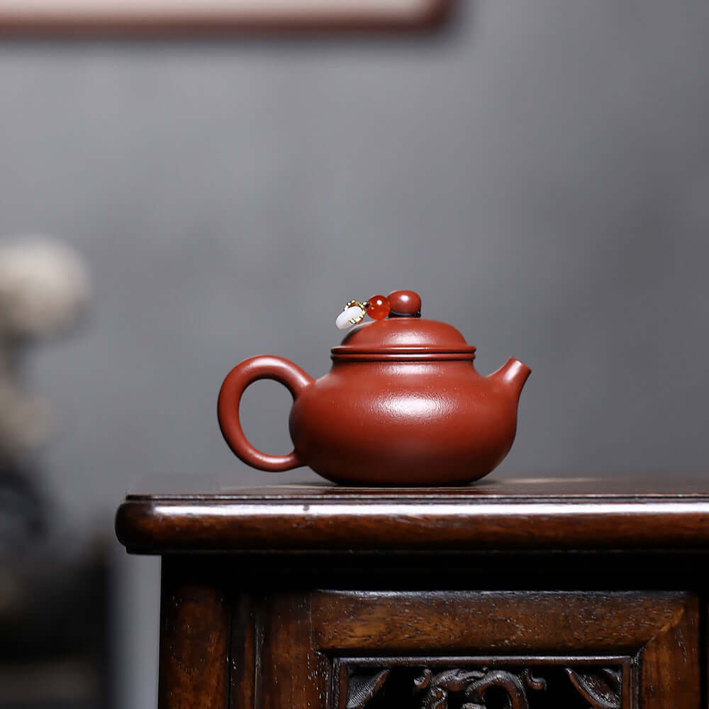 Handmade Yixing purple sand teapot with unique design, perfect for home Kung Fu tea sets and tea lovers.