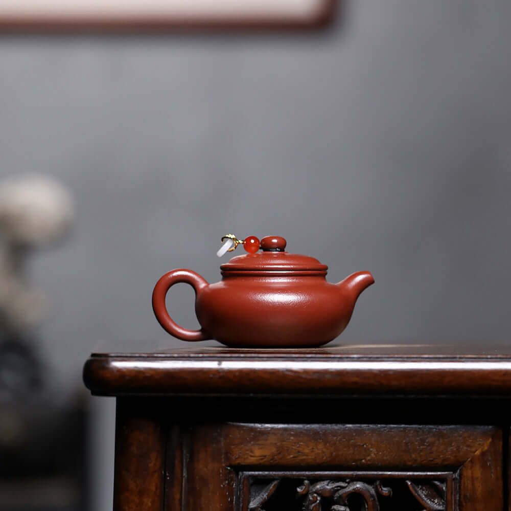 Handmade Yixing purple sand teapot with mineral wrinkled skin, perfect for brewing kung fu tea at home.