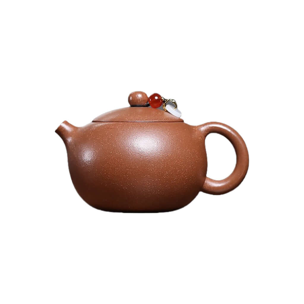 Handmade Yixing purple sand teapot with traditional design, perfect for kung fu tea sets and elegant home decor.