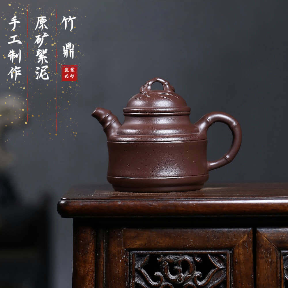 Handmade Yixing purple sand teapot featuring a bionic bamboo tripod design, ideal for Kung Fu tea sets.