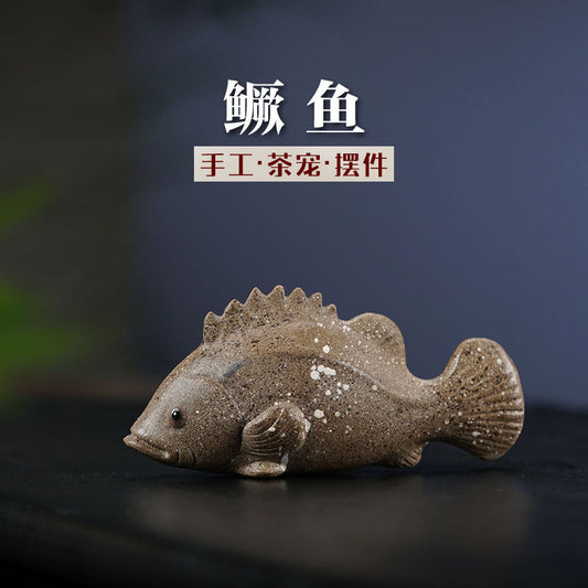 Handmade Yixing purple sand tea pet model of a mandarin fish, perfect for early education and tea enthusiasts.