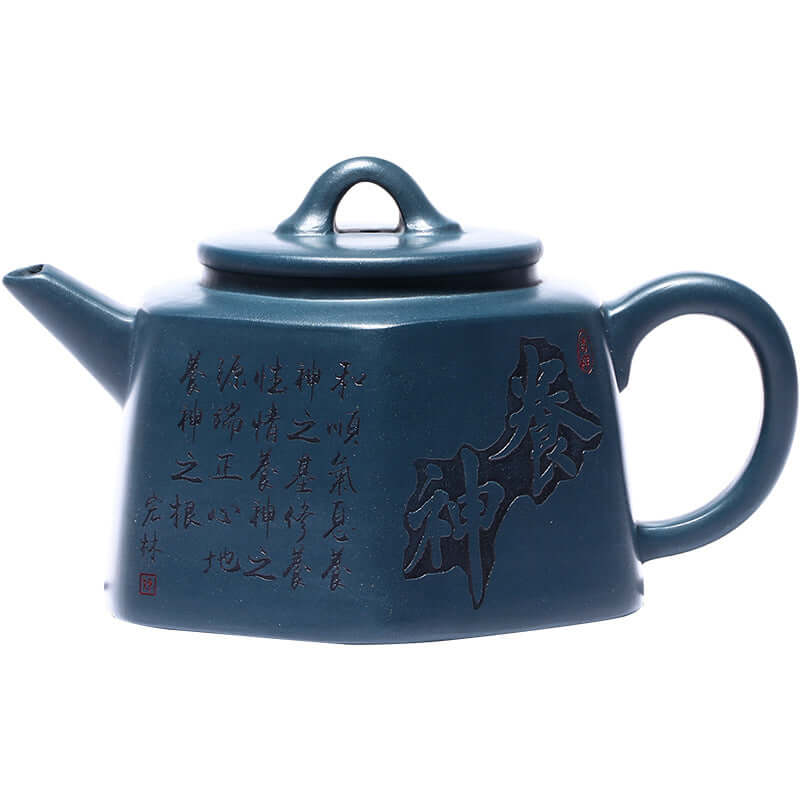 Handmade Yixing purple sand teapot in sky green clay, featuring elegant hexagonal design and traditional artistry.