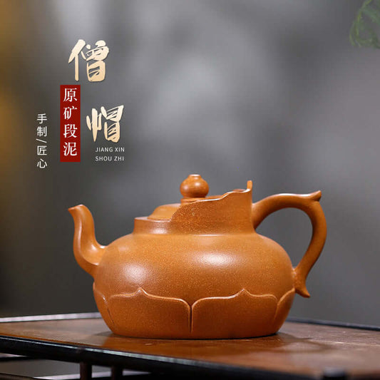 Handmade Yixing purple sand monk cap teapot featuring elegant design and smooth finish, perfect for Kung Fu tea sets.