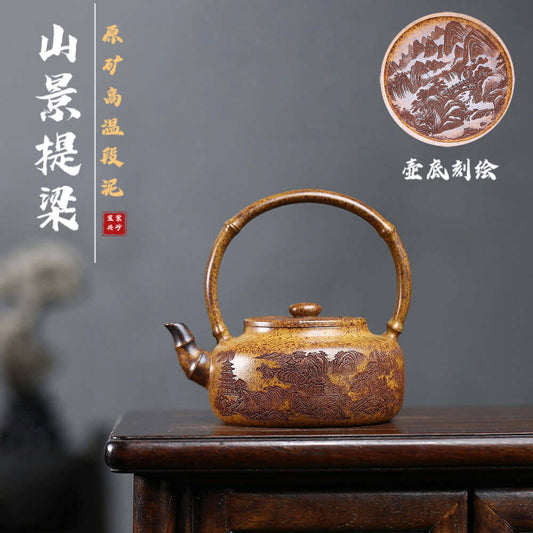 Handmade Yixing purple sand teapot with a mountain scenery design, perfect for kung fu tea sets.