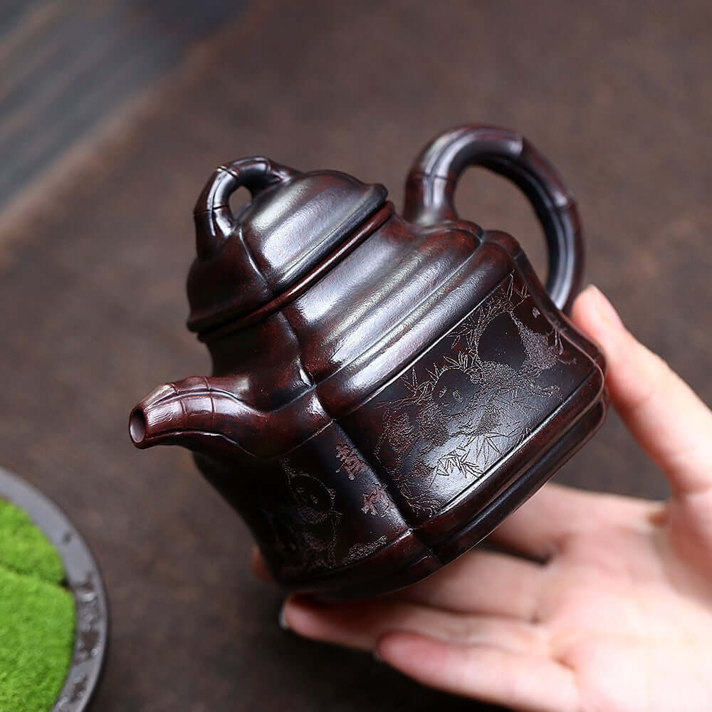 Handmade Yixing purple sand teapot, crafted with original iron red sand, featuring panda bamboo design for home kung fu tea set.