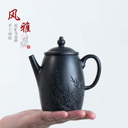 Handmade Yixing purple sand teapot with elegant design, showcasing craftsmanship and unique texture.