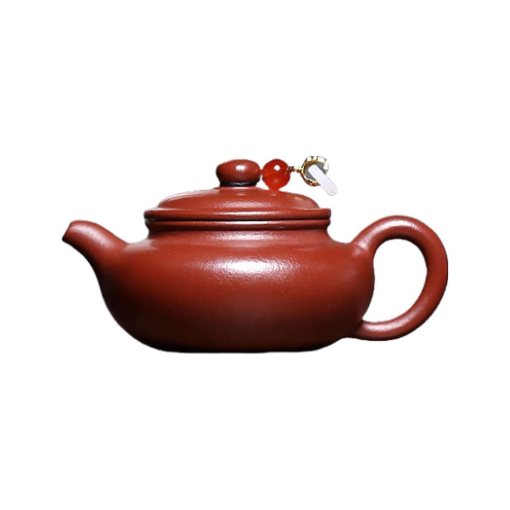 Handmade Yixing purple sand teapot with unique mineral texture, perfect for home Kung Fu tea brewing.