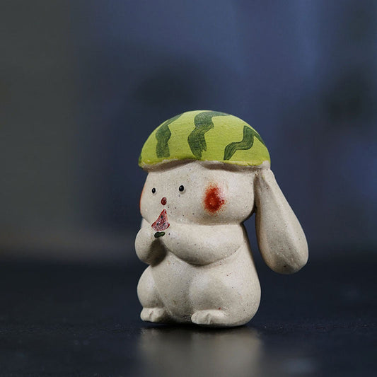 Handmade Yixing purple sand cute rabbit doll ornament, ideal for tea lovers and garden decor, unique collectible figure.