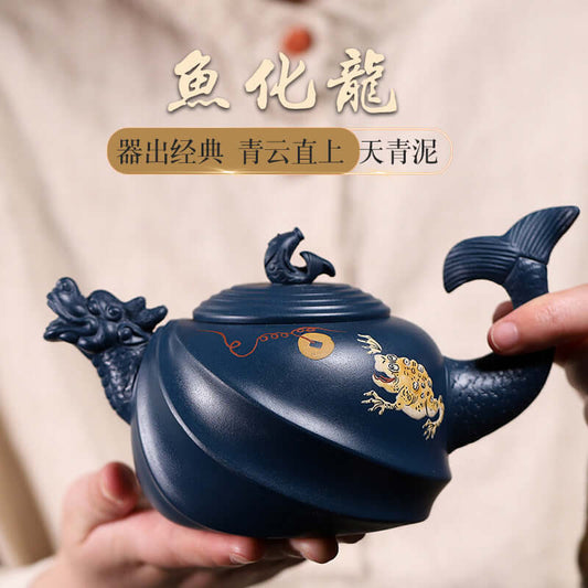 Handmade Yixing purple sand teapot featuring a fish dragon design, crafted from traditional Tianqing clay, ideal for Kung Fu tea.