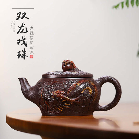 Handmade Yixing purple sand teapot with dragon design, showcasing intricate craftsmanship and artistic details.