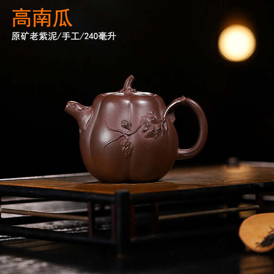 Handmade Yixing purple sand teapot in a pumpkin shape, crafted from original purple sand for home tea brewing.