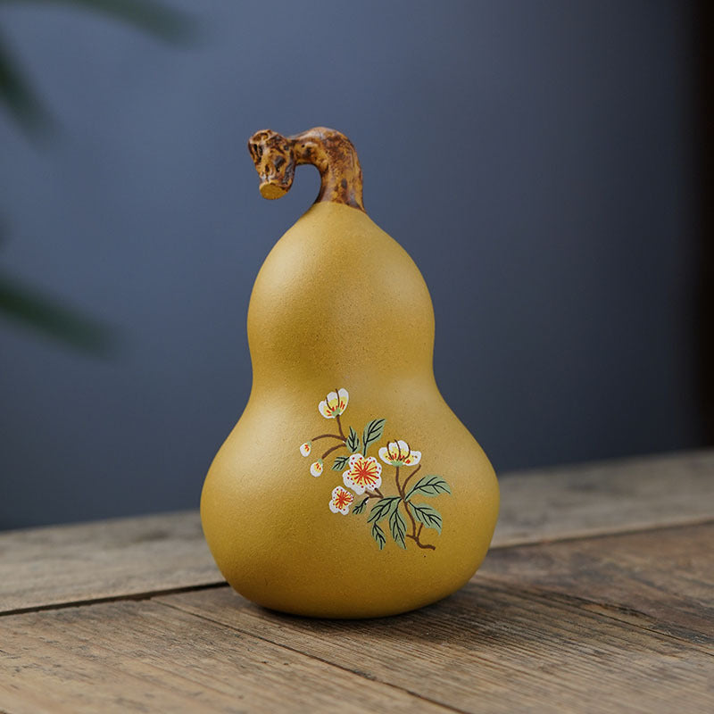 Handmade Yixing purple sand tea pet gourd ornament, crafted from raw ore by skilled artisans. Ideal for tea play.