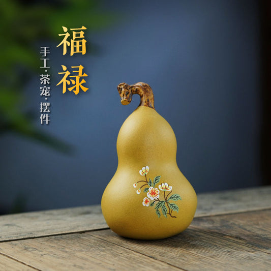Handmade Yixing purple sand gourd tea pet ornament, crafted by a Yixing artisan, perfect for tea play decor.