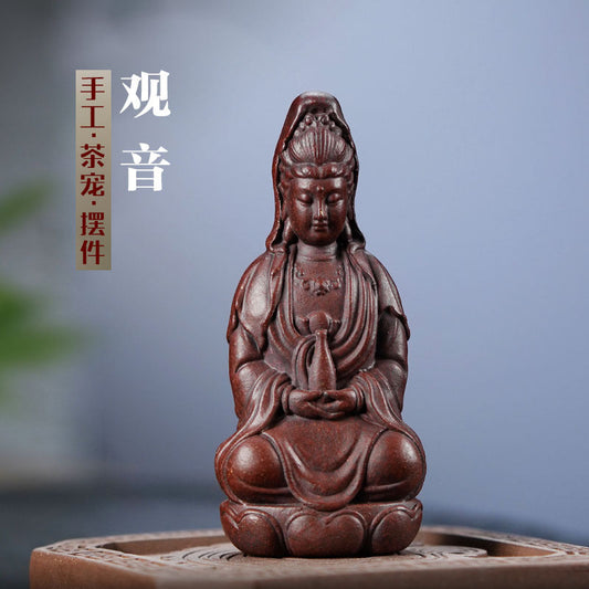 Handmade Yixing purple sand Guanyin statue, intricate Bodhisattva sculpture for tea sets, perfect decorative ornament.