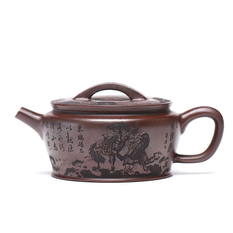 Handmade Yixing purple sand teapot with intricate artwork and traditional design.