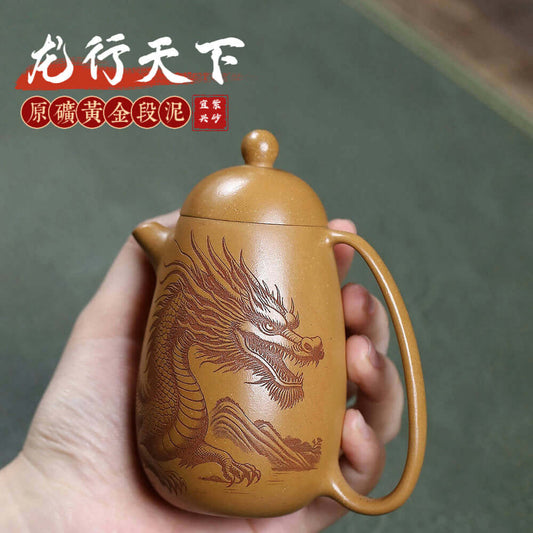 Handmade Yixing purple sand teapot with dragon design, perfect for kung fu tea sets and collectors.