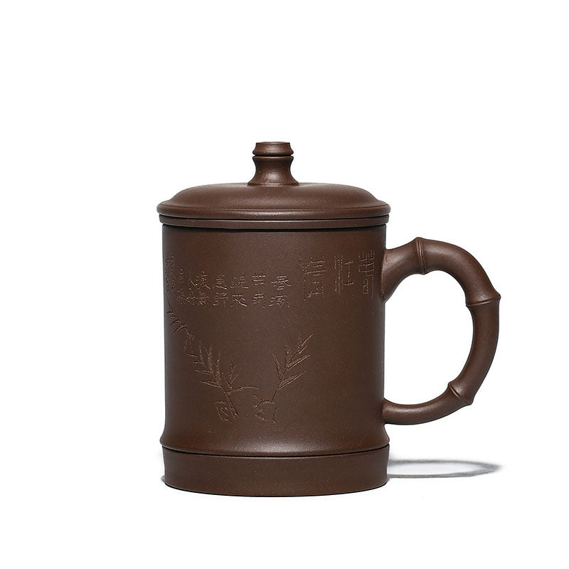 Handmade Yixing purple sand cup with bamboo design, featuring engraved lettering and a lid, perfect for office gifts.