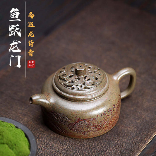 Handmade Yixing purple sand teapot featuring intricate dragon design, ideal for home tea set and tea lovers.