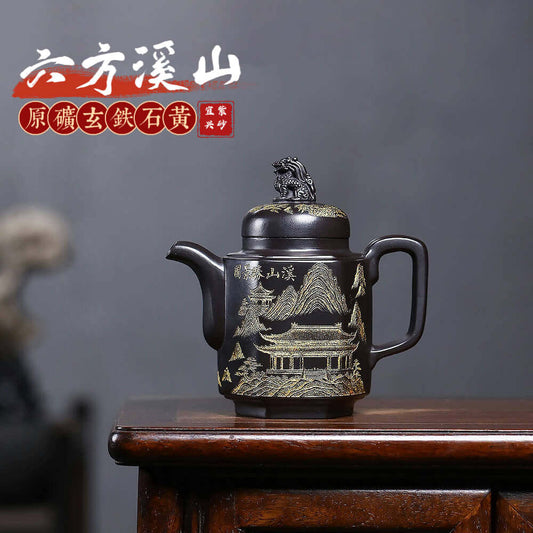 Handmade Yixing purple sand teapot with intricate mountain design, perfect for kung fu tea ceremonies.