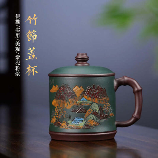 Handmade Yixing purple sand mug with landscape engraving, perfect for tea ceremonies and collectors.